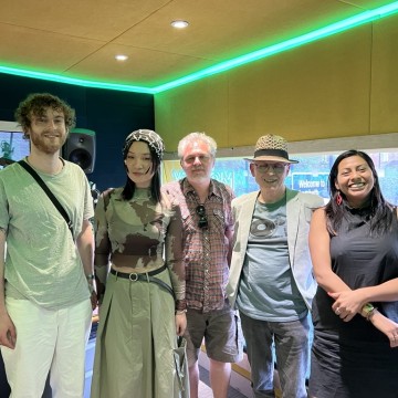 5 people in Morley Radio studio standing smiling