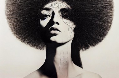 black and white female head afro