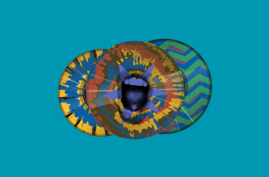3 Multicoloured vinyls on blue background