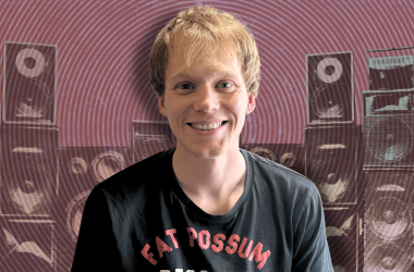 Thomas Winter host cut out in front of speakers on red swirly background