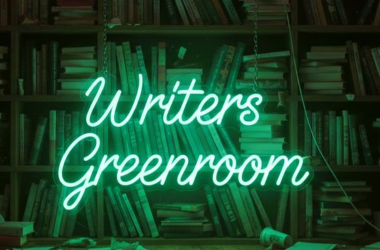 Writers Greenroom sign hanging in neon green type against dark bookshelf background