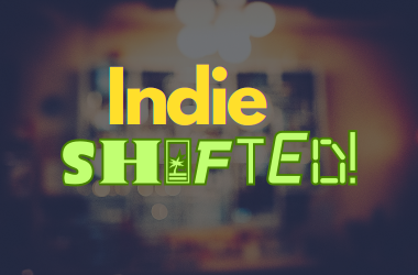 Indie Shifted! yellow and green text against blurred pub background